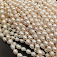 Жемчуг натуральный, Рис 6-7*5.5мм, белый; нить 37см