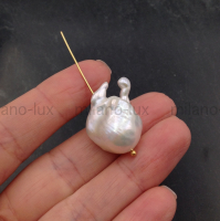 Крупная АAA Grade жемчужина с ядром, размер 23мм; #60