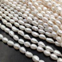 Жемчуг натуральный 10-13мм Белый, барочный рис; нить 39см