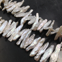 Жемчуг натуральный Палочка Бива A Grade 25-29мм; ПАРА бусин